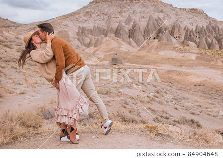 Happy couple on summer vacation in famous place. Cave formations. Happy couple on summer vacation in famous place. Cave formations. 84904648