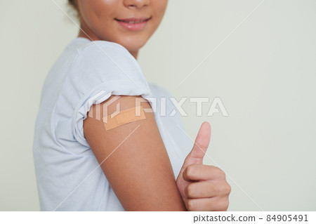 Happy Teenager after Getting Vaccine 84905491