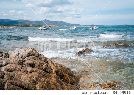 beautiful view of the wavy sea on the east coast of Sardinia in Italy Europe beautiful view of the wavy sea on the east coast of Sardinia in Italy Europe 84909916