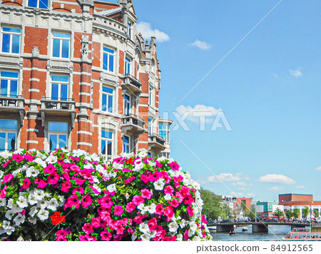 Dutch flowers and fashionable streets of Amsterdam Dutch flowers and fashionable streets of Amsterdam 84912565