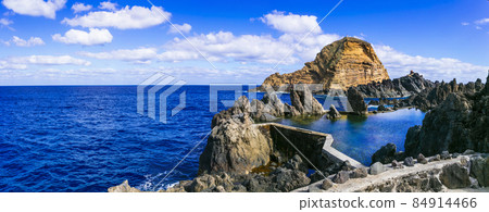 Porto Moniz, Madeira Island, Portugal .Volcanic lava natural swimming pools, popular tourist attraction Porto Moniz, Madeira Island, Portugal .Volcanic lava natural swimming pools, popular tourist attraction 84914466