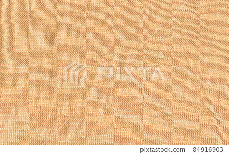 Honeydew knitted boho fabric texture with blank space for ads. Honeydew knitted boho fabric texture with blank space for ads. 84916903