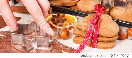 Dough, accessories with ingredients for baking gingerbread and fresh baked cookies for Christmas 84917047
