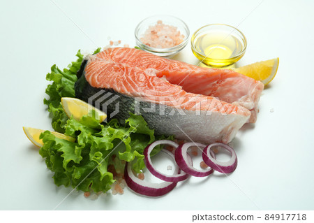 Concept of cooking salmon on white background Concept of cooking salmon on white background 84917718