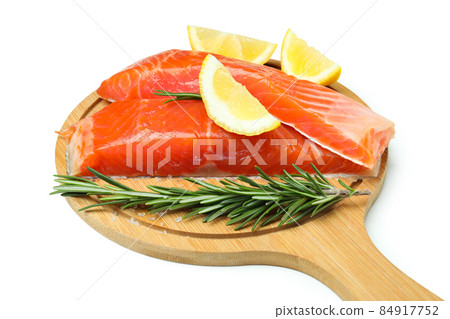Board with fresh raw salmon isolated on white background 84917752