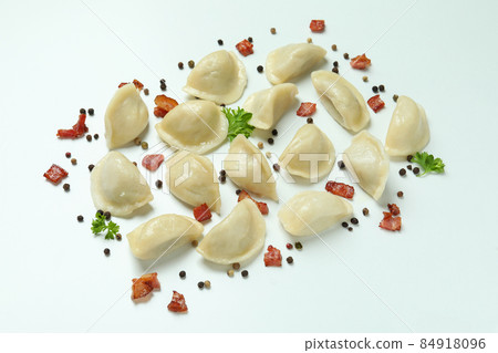 Concept of tasty food with vareniki or pierogi on white background 84918096