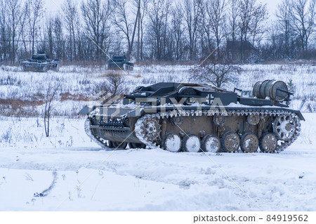 Russia. St. Petersburg. December 12, 2021. Reconstruction of the battle for the liberation of the city of Tikhvin. German self-propelled howitzer StuG III before the battle. 84919562