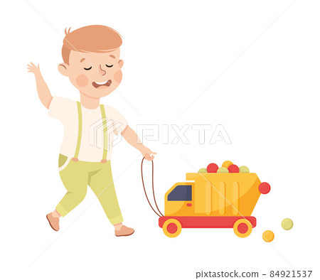 Smiling Boy Pulling Toy Truck with Colorful Balls Playing and Having Fun Vector Illustration 84921537
