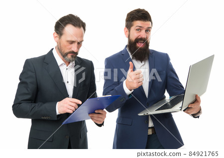 Best practice in professional service. Bearded men work  84921765