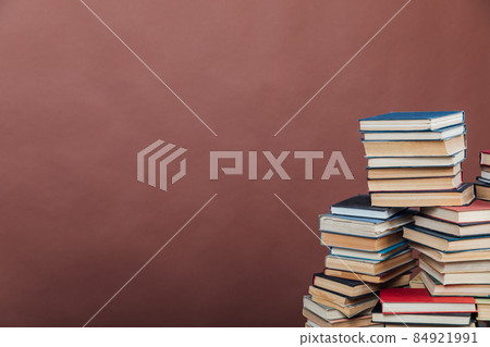 Stacks of books for teaching knowledge university library brown background Stacks of books for teaching knowledge university library brown background 84921991