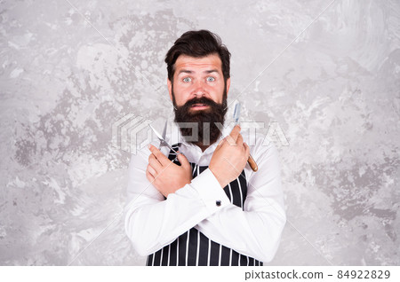 Male beauty. Barbershop master. Maintain stylish shape. 84922829