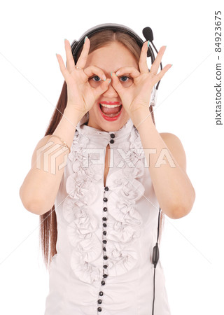 Pretty teenage girl listening music on her headphones Pretty teenage girl listening music on her headphones 84923675