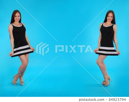 Cheerful young girl. Mirror reflection. Cheerful young girl. Mirror reflection. 84923794