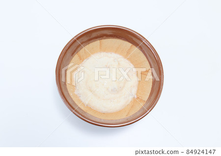 Grated yam in a mortar Grated yam in a mortar 84924147
