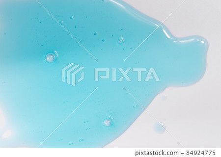 Liquid swatch care cosmetics on a white surface 84924775