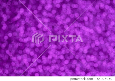 Festive violet pattern background. Holiday glowing party decoration. Magic illuminated lights. 84926930