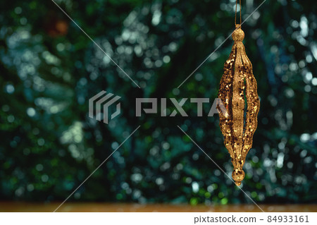 Christmas ornaments glass baubles on green bokeh background 84933161