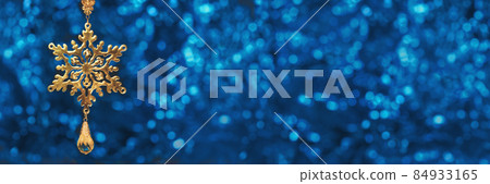 Christmas ornaments glass baubles on wide blue bokeh background Christmas ornaments glass baubles on wide blue bokeh background 84933165