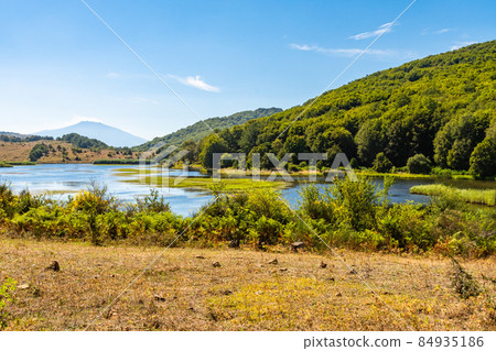 View of Biviere lake with Etna volcano, Nebrodi National Park, Sicily, Italy 84935186