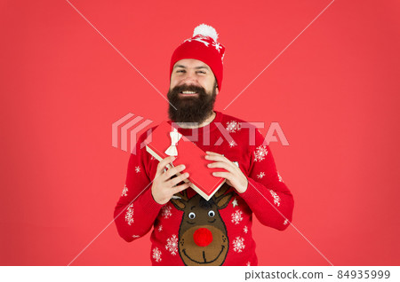 Hipster in winter sweater. Respect traditions. Merry christmas.  84935999