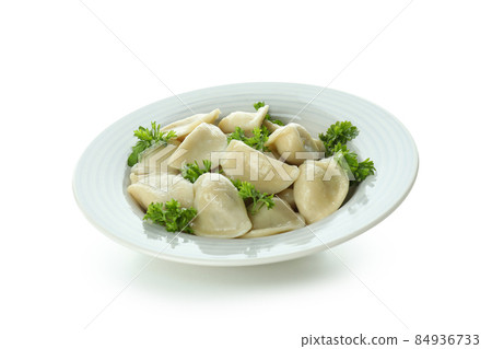 Plate with vareniki or pierogi isolated on white background 84936733