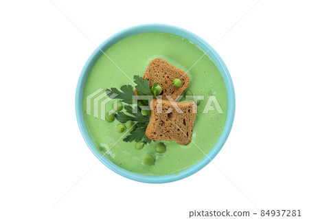 Plate of pea soup isolated on white background Plate of pea soup isolated on white background 84937281
