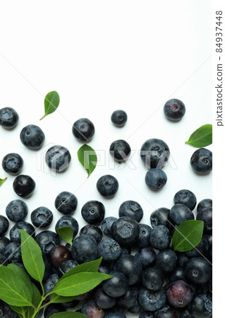 Fresh blueberry with leaves on white background 84937448