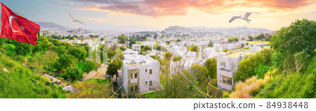 Bodrum panorama with white houses and marina with Turkish flag Bodrum panorama with white houses and marina with Turkish flag 84938448