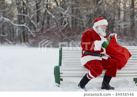 Santa Claus Sitting In Park Santa Claus Sitting In Park 84938548