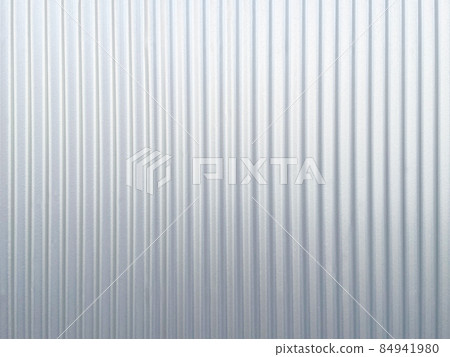 Background image of the surface of galvanized iron corrugated sheet painted in light silver metallic 84941980