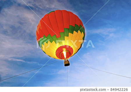 Air balloon in the evening sky 84942226