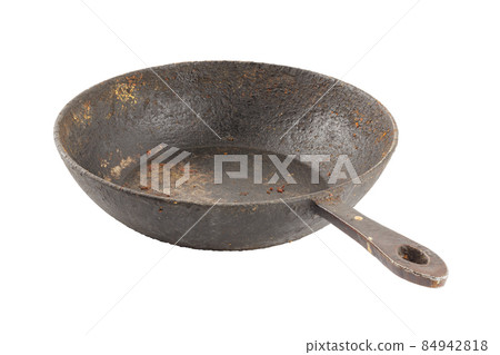 old disgusting stained rusty cast iron pan with burnt fat and food leftovers isolated old disgusting stained rusty cast iron pan with burnt fat and food leftovers isolated 84942818