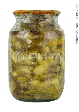 old pickles in glass jar with rusted cap in bad condition isolated on white background old pickles in glass jar with rusted cap in bad condition isolated on white background 84942956