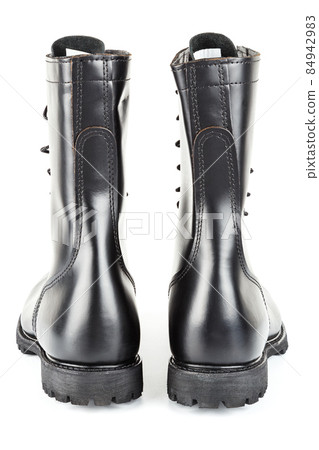 back view on pair of black leather 10-inch new black military combat jump boots, isolated on white background 84942983