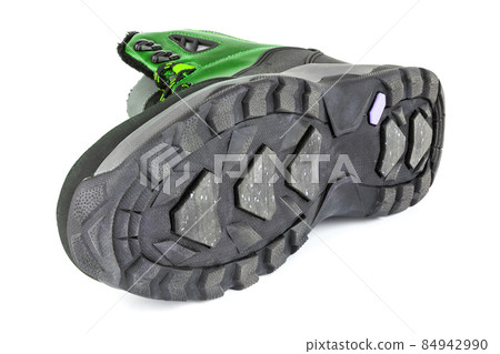 insulated green winter warm three quarter sneaker or boot isolated on white background, laid on side 84942990