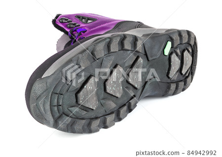 insulated pink winter warm insulated three quarter sneaker or boot isolated on white background, laid on side insulated pink winter warm insulated three quarter sneaker or boot isolated on white background, laid on side 84942992