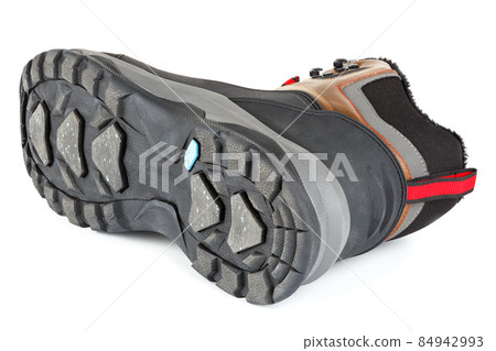 brown winter warm insulated three quarter sneaker or boot isolated on white background, laid on side brown winter warm insulated three quarter sneaker or boot isolated on white background, laid on side 84942993