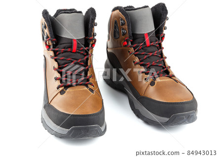 pair of brown insulated winter warm three quarter sneakers or boots isolated on white background pair of brown insulated winter warm three quarter sneakers or boots isolated on white background 84943013
