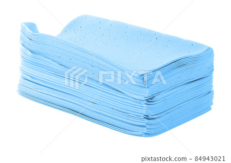stack of blue liquidless and powderless laundry detergent squares sheets isolated on white background 84943021
