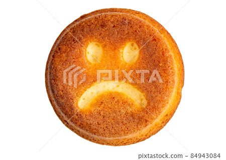 unhappy face biscuit cookie isolated on white in flat lay perspective unhappy face biscuit cookie isolated on white in flat lay perspective 84943084