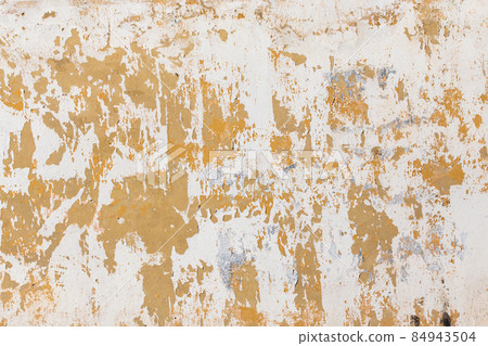 Shabby flat plaster and painted wall with big yellow under layer spots Shabby flat plaster and painted wall with big yellow under layer spots 84943504