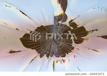 close-up view of physically damaged lcd screen surface with impact spot, radial cracks, pixel grid leakage and discoloration close-up view of physically damaged lcd screen surface with impact spot, radial cracks, pixel grid leakage and discoloration 84943972