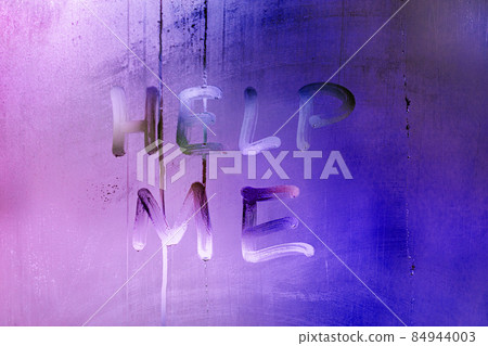 words help me handwritten on night wet window glass with purple and blue color gradient words help me handwritten on night wet window glass with purple and blue color gradient 84944003