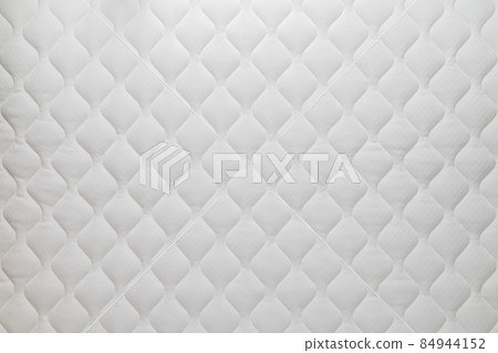 Soft white mattress flat background and texture. 84944152