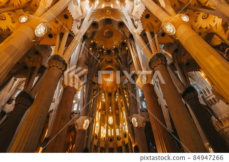 Gaudi's Masterpiece Sagrada Familia Basilica. Light through stained glass windows. Mosaic. UNESCO 84947266