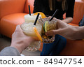 People drinking cocktails. Cocktail cheers 84947754