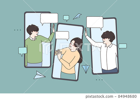 People communicate text online on cellphone devices People communicate text online on cellphone devices 84948680