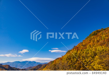 Beautiful mountains and autumnal trees Beautiful mountains and autumnal trees 84949140