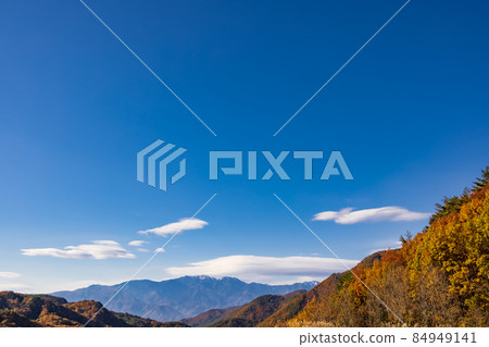 Beautiful mountains and autumnal trees Beautiful mountains and autumnal trees 84949141