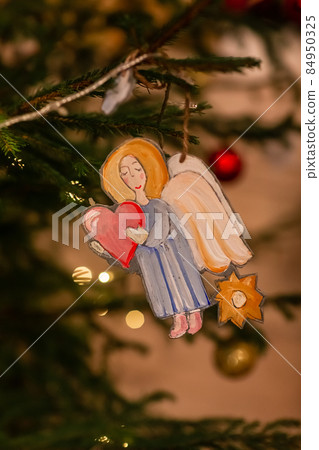 Decorated Christmas tree in Orthodox church on Christmas eve Decorated Christmas tree in Orthodox church on Christmas eve 84950325